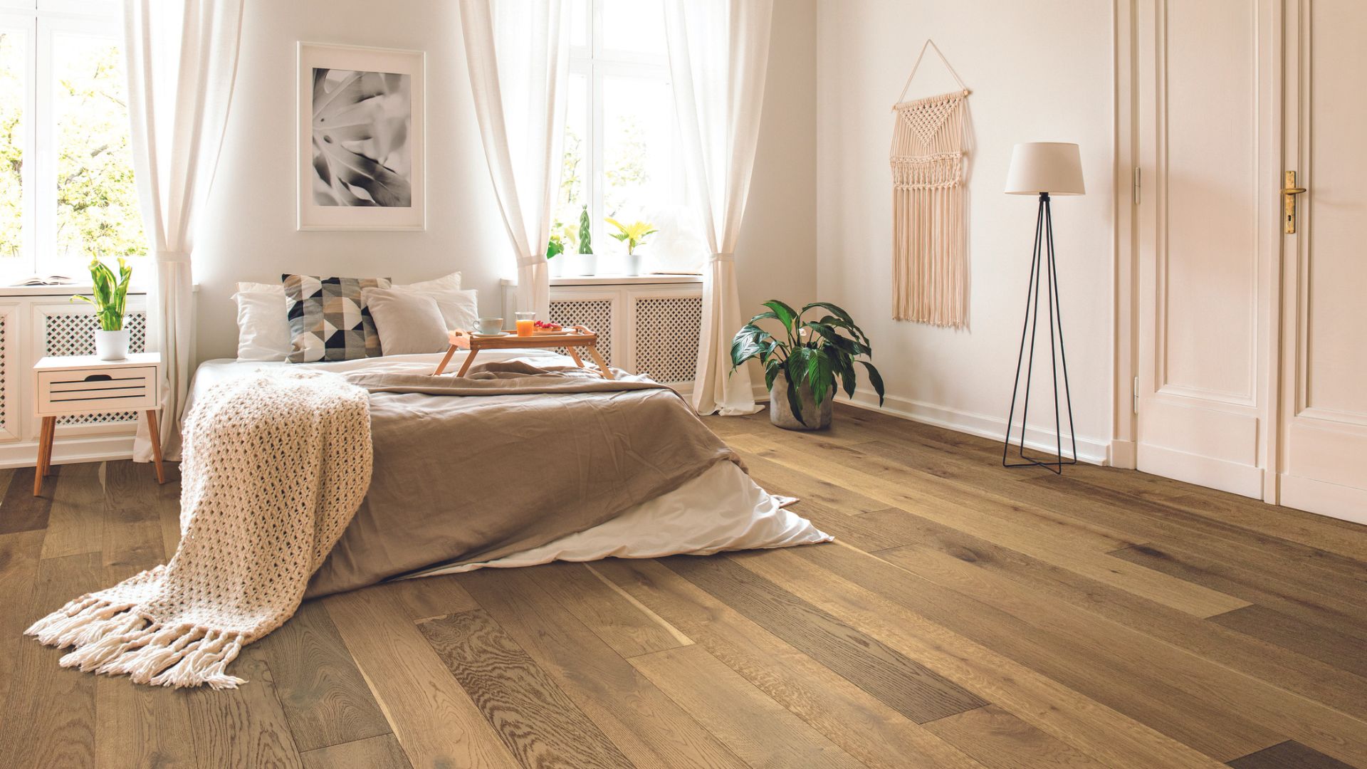 Hardwood floors in a bedroom.